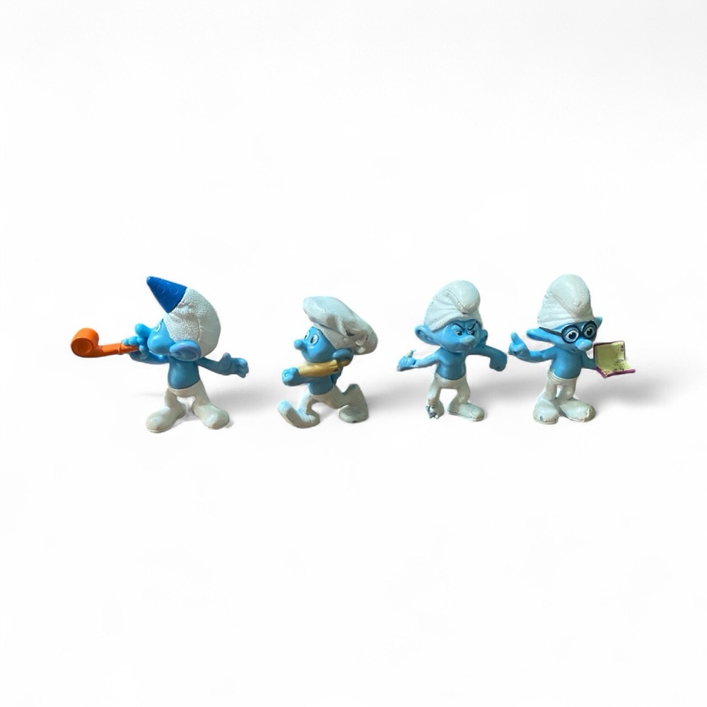 Set of Blue 4 Smurf Figurines From the 2013 Smurfs 2 Movie Collectibles
